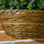 34cm Faux Flowering Plant in Wicker/Rattan Basket