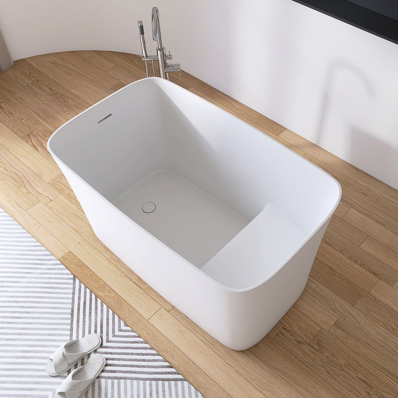 Baignoire autoportante de 47 po x 28 po à surface solide avec siège
