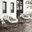 Fauteuil de véranda beige avec fonction bascule pour profiter du plein air -