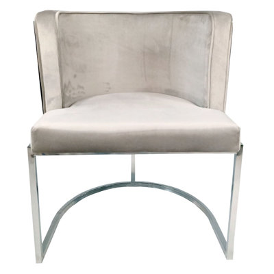 Chaise avec accoudoirs revêtue de velours