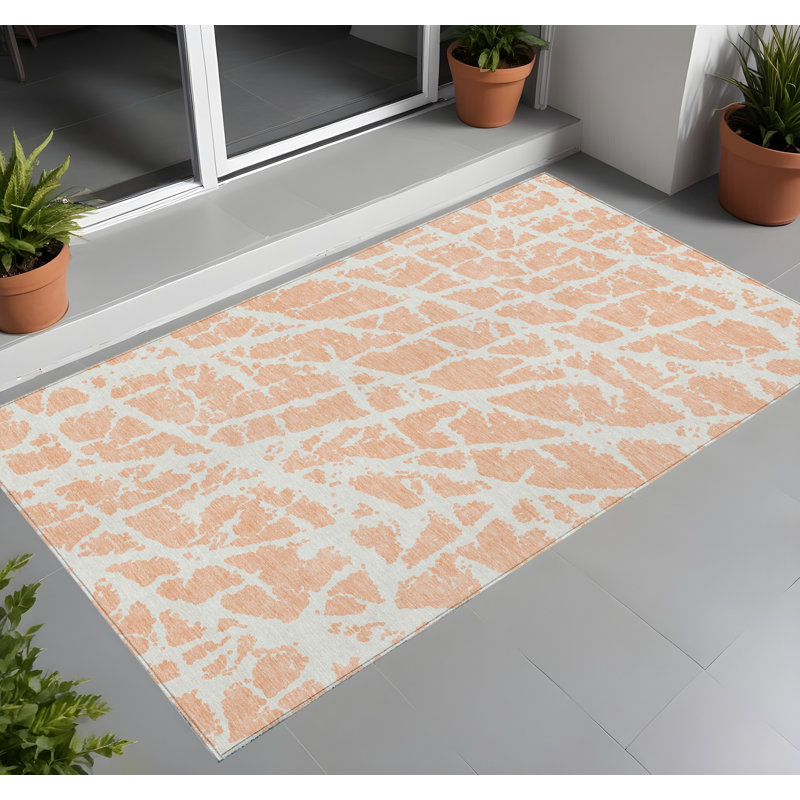 2' X 3' Peach and Ivory Abstract Washable Non Skid Indoor Outdoor Area Rug