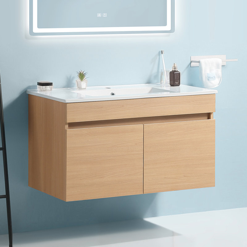 Élégant meuble-lavabo mural de 24 po avec lavabo en céramique blanche, portes d'armoire à fermeture douce, bois massif en chêne clair - robinet exclu