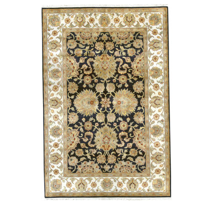Hand Knotted Wool Oriental Area Rug in Black And Ivory