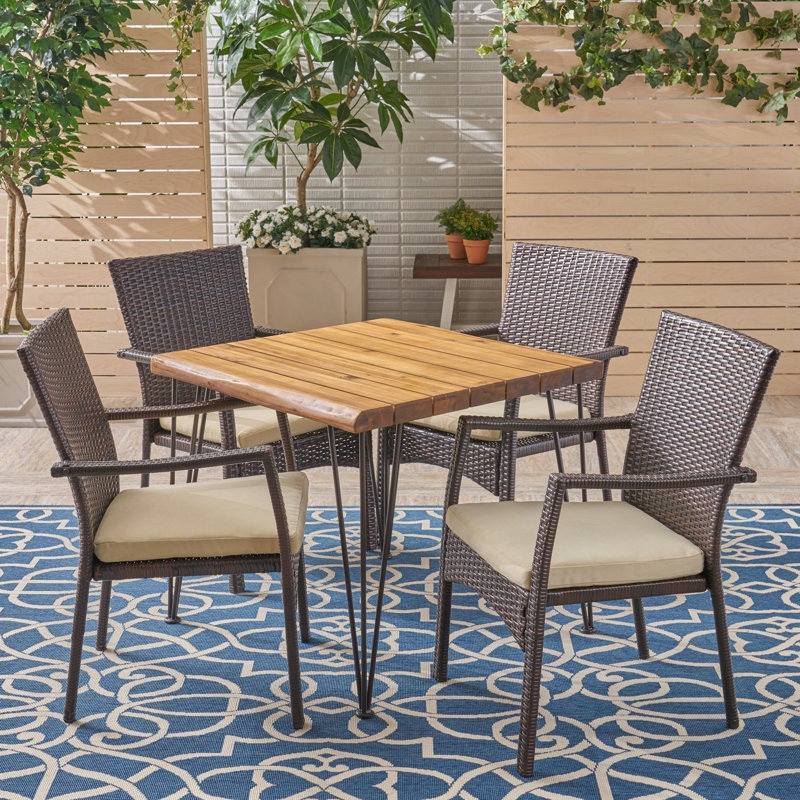 Edmundson 4 - Person Acacia Wicker Patio Dining Set with Square Table , Cushions Included