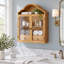 Armoire murale vintage en bois massif avec un élégant plateau ondulé