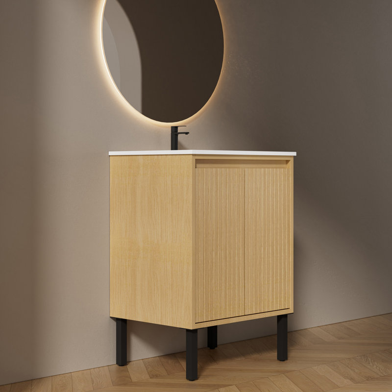 Ensemble de meuble-lavabo simple autoportant avec lavabo en résine à surface solide intégré, portes d'armoire cannelées et pieds en métal