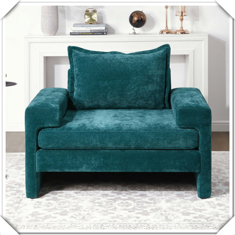 Fauteuil rembourré avec accoudoirs larges et coussin épais, Vert