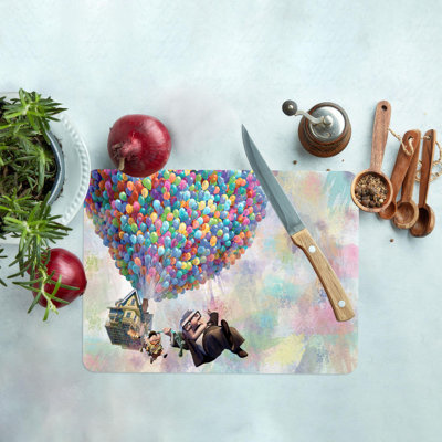 Planche à découper moderne en verre coloré d'inspiration cinéma avec touche personnalisée en verre durable pour une expérience de cuisine unique