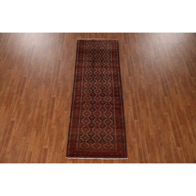 Tapis à motif géométrique 3x9