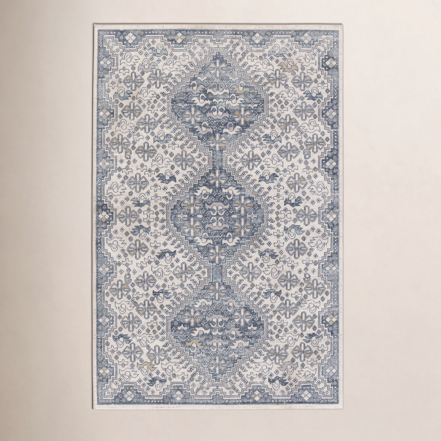 Phoebe Cream Blue Machine Washable Oriental Rug, Rectangle 5'3" x 8'