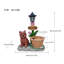 Statue d'extérieur de jardinière solaire chiot assis