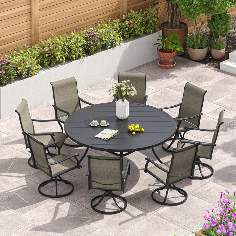 Nectarie Round 8 - Person 54'' L Outdoor Patio Dining Set with 8 Swivel PVC-Coated Polyester Chairs, Black/Black