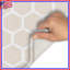Tapis de bain beige à motif hexagonal-1430752458