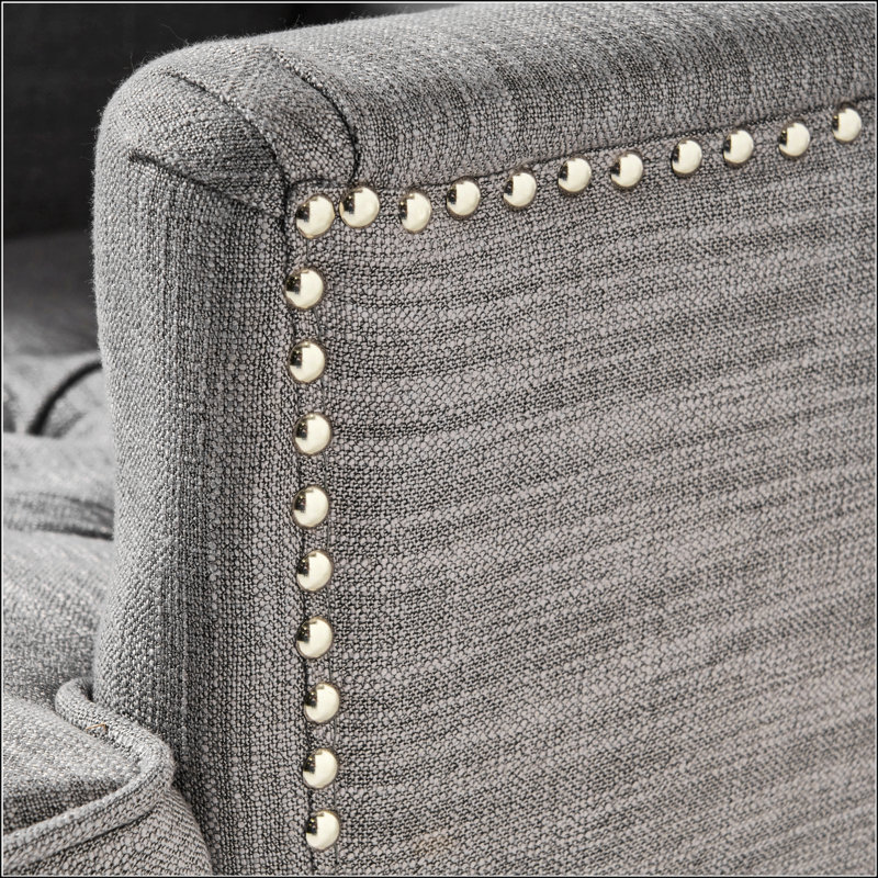 Fauteuil club capitonné