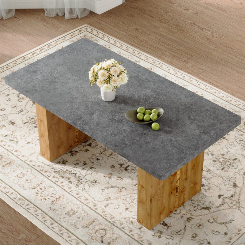 Grande table rectangulaire moderne avec plateau à motif gris ciment et grands pieds en panneau de fibres à densité moyenne pour la cuisine, la salle à manger et le salon afin de créer une atmosphère différente