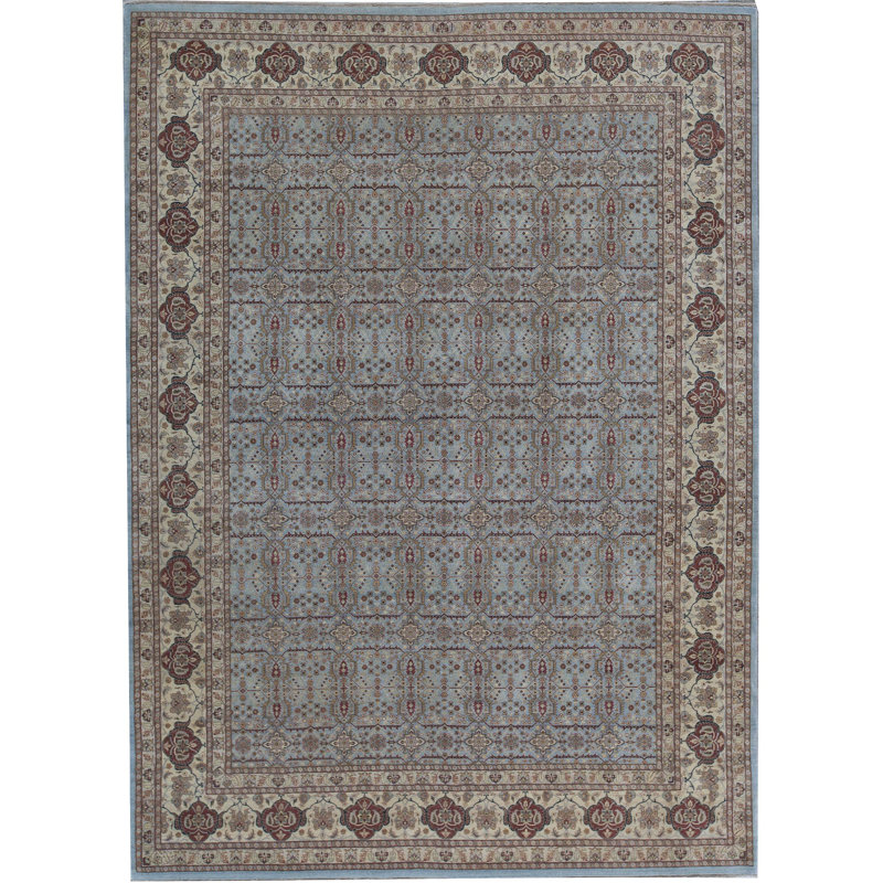 Tapis bleu et ivoire de haute qualité noué à la main