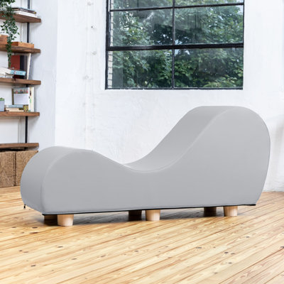 Chaise longue Allisha pour étirer et se détendre, pieds en bois d'érable - similicuir