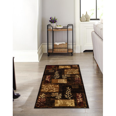 Tapis floral brun / jaune en polypropylène tissé à la machine Mehtap