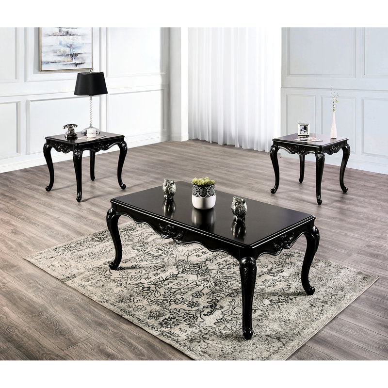 / finition noire, table basse rectangulaire traditionnelle, structure en bois massif, pieds courbés, détails décoratifs, pieds