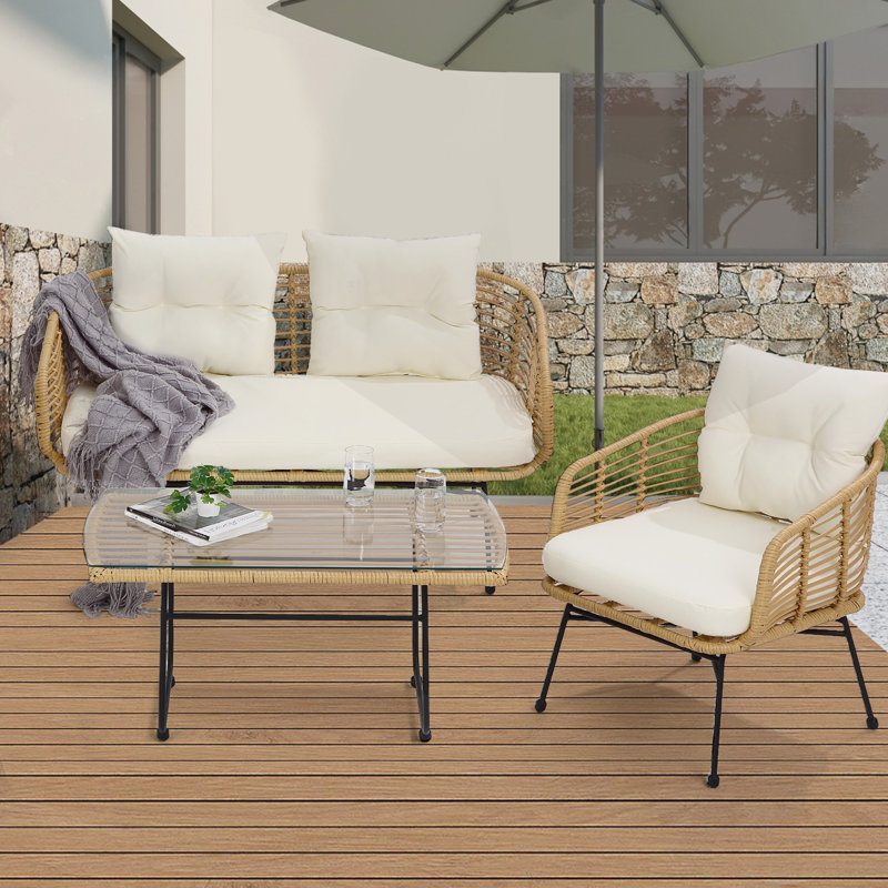 Ensemble de meubles de patio en rotin 4 pièces avec causeuse en osier et coussins pour table basse