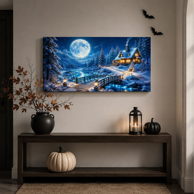 Cabane en bois rond enneigée avec pont en bois et grande toile bleue d'Halloween