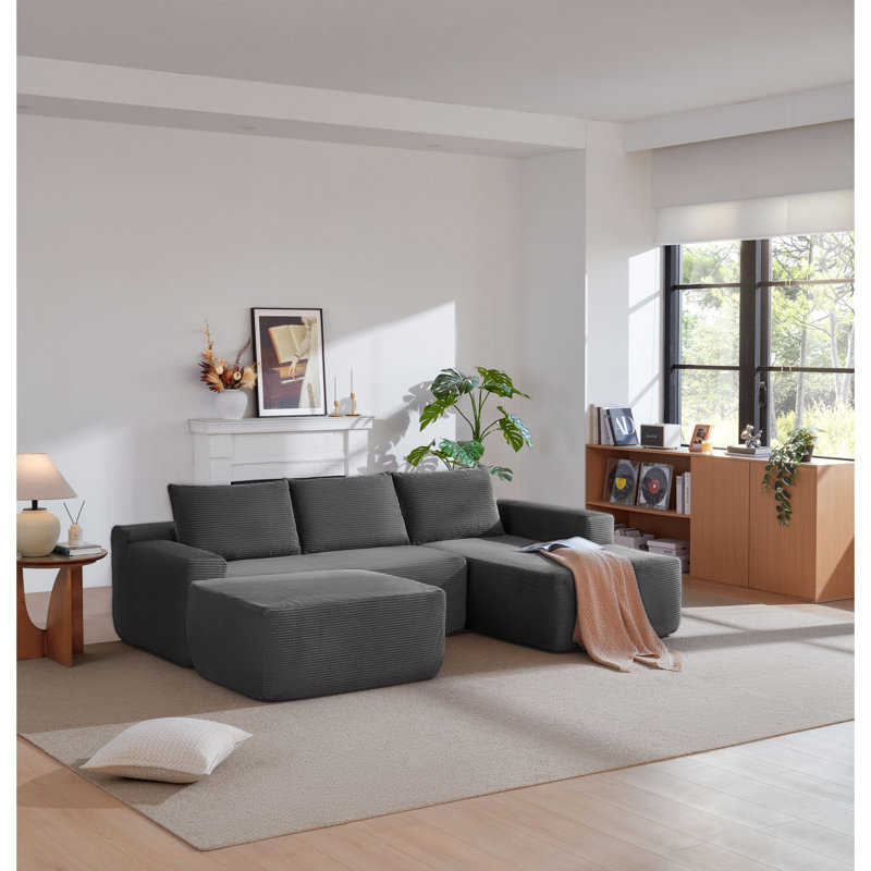 Canapés modulaires spacieux en tissu gris moelleux, style de vie moderne
