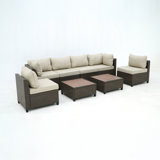Deko Living 8-Piece Outdoor Sectional Wicker Sofa Set with Chairs and Tables, featuring Interchangeable Cushion Covers and Red Model