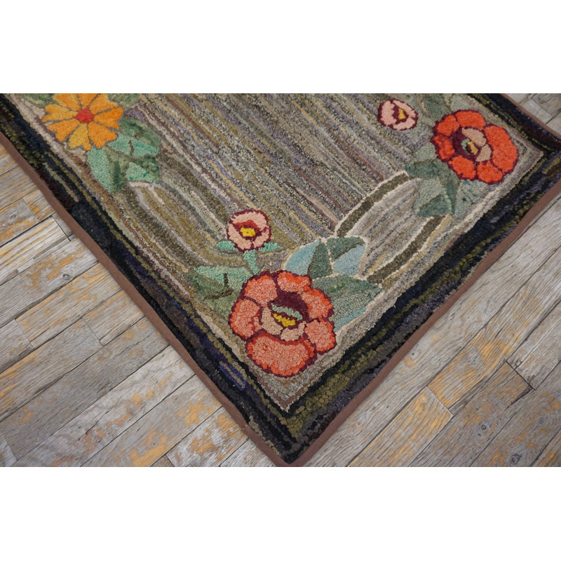 Tapis à motif floral abstrait gris