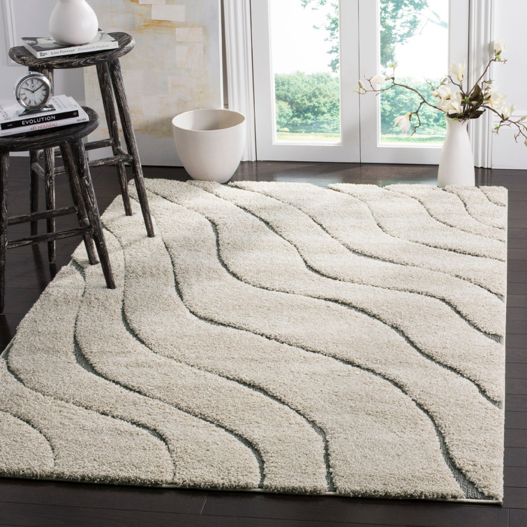 Ashal Animal Print Cream/Gray Area Rug