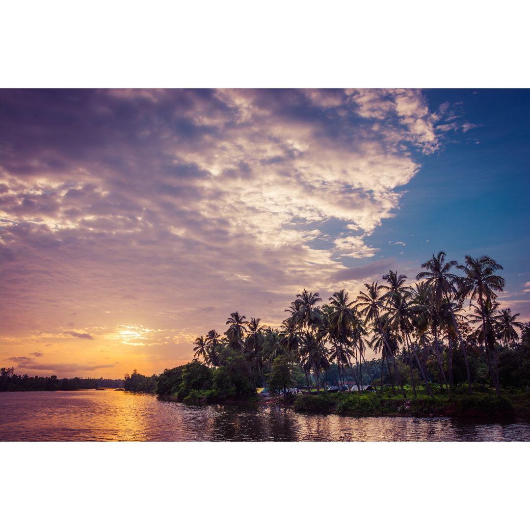 Palm Trees And Amazing Cloudy Sky On Sunset von Focusphotoart - Kunstdrucke ohne Rahmen auf Leinwand