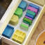 Organisateur de couvercles extensible pour aliments