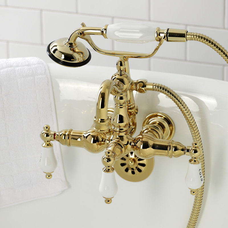 Kingston Brass Heritage Three-Handle 2-Hole Tub Wall Mount Clawfoot Tub Faucet with Hand Shower, Polished Brass