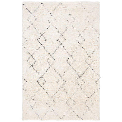 Powell Hand Tufted Wool Geometric Rug