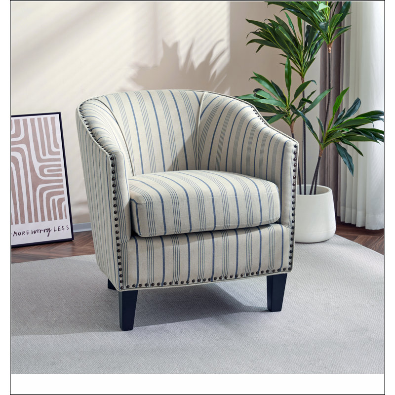 Fauteuil demi-tonneau rembourré à rayures