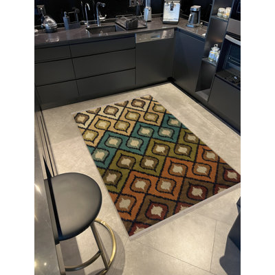 Tapis décoratif multicolore à motifs géométriques mixtes