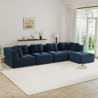 Canapé modulaire moderne pour le salon, tissu en velours côtelé, canapé 4 places avec assise profonde et repose-pieds mobile, passepoil perlé, conception capitonnée, sans assemblage, conception antidérapante, bleu