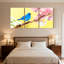 Oiseaux bleus sur une branche de fleurs sur fond jaune, ensemble de 3 impressions sur toile-363143870