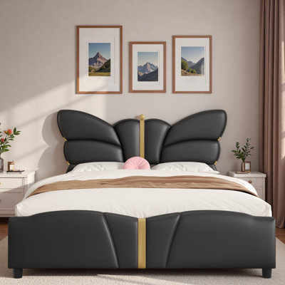 Lit plateforme tapissier avec tête de lit en forme de papillon et décorations en métal doré