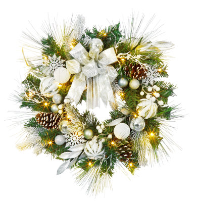 Couronne de Noël illuminée de 61 cm pour porte d'entrée - Fonctionne sur piles avec minuterie, 20 lumières DEL, flocons de neige, pommes de pin, nœud argenté et boules blanches et argentées - Intérieur/Extérieur - Argenté