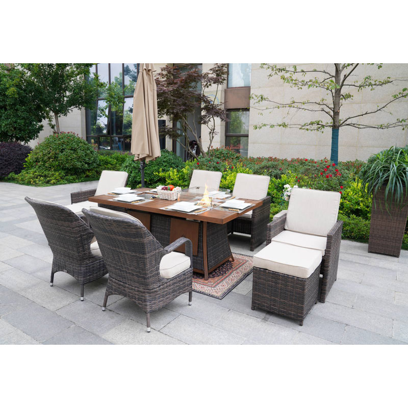 Aquiel 10 - Person Wicker Patio Dining Set with Rectangular Table , Cushions Included