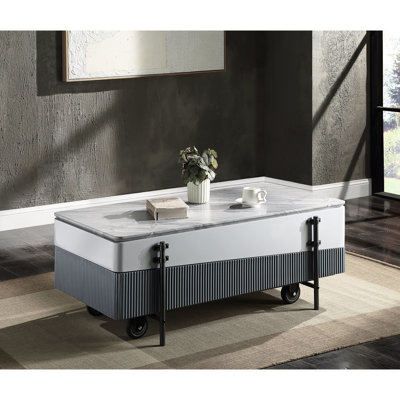 Table basse grise et blanche avec coffre de rangement modulaire et pratique