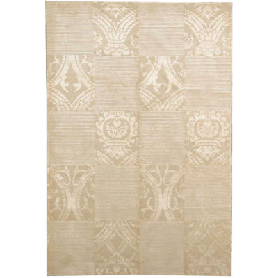 Tapis doré de haute qualité noué à la main