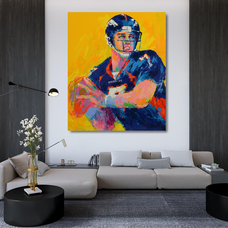 John Elway, H 44 po x l 36 po