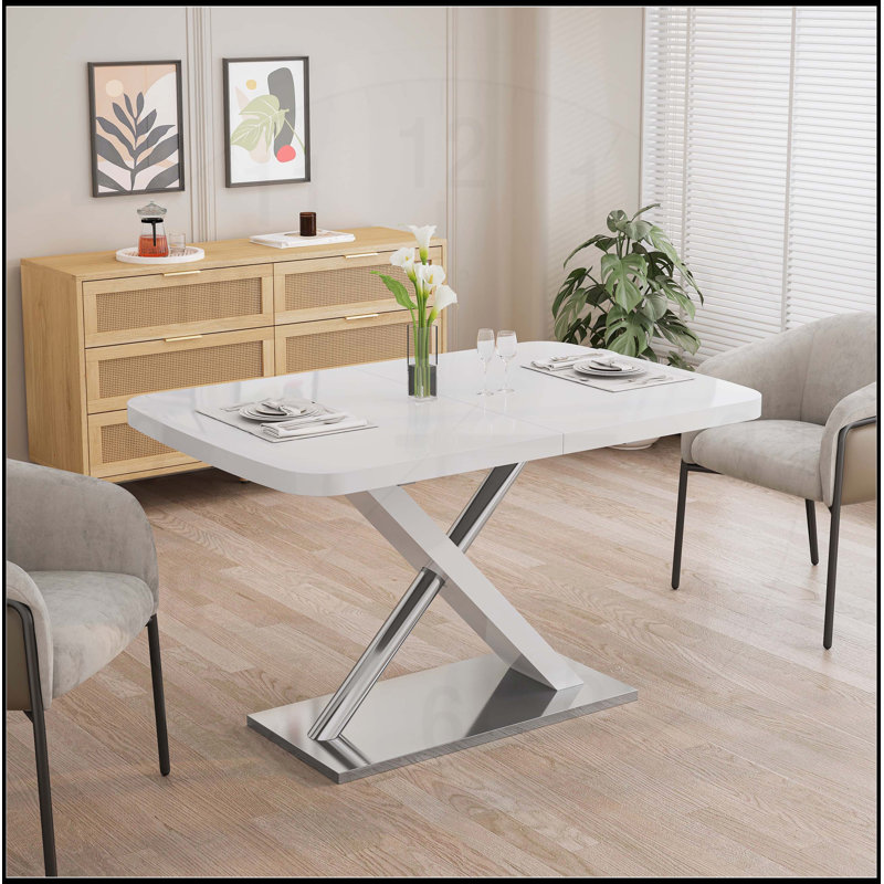 Table de salle à manger rétractable avec base en métal, en bois, pour 4 à 6 personnes, parfaite pour les espaces flexibles et les espaces de salle à manger.