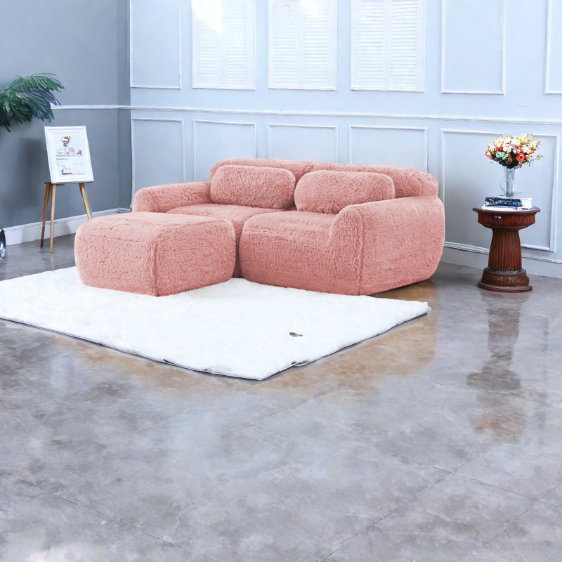 Canapé modulaire rose confortable, tissu moelleux, conception moderne pour les chambres à coucher