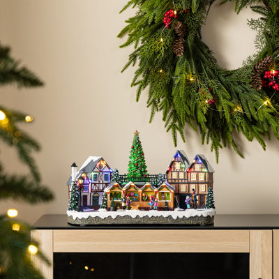 15.25" Oversized Lighted Christmas Village House with Musical Function