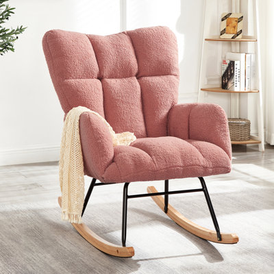 Chaise berçante rose avec structure en tissu et en métal, ergonomique, fauteuil oscillant zones de confort dans la chambre à coucher