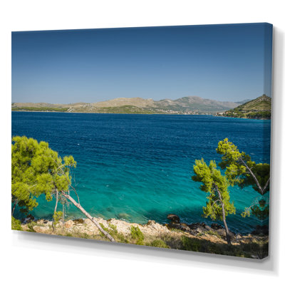 Plage avec eau cristalline en Croatie - Reproduction de photo sur toile