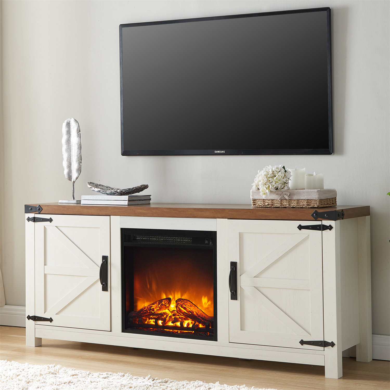 https://assets.wfcdn.com/im/86322357/compr-r85/2602/260299573/najya-farmhouse-tv-stand-for-tvs-up-to-65-with-electric-fireplace-adjustable-shelves-2-barn-doors.jpg