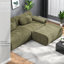 Grands canapés modulaires en chenille verte, fauteuil en bambou et salon